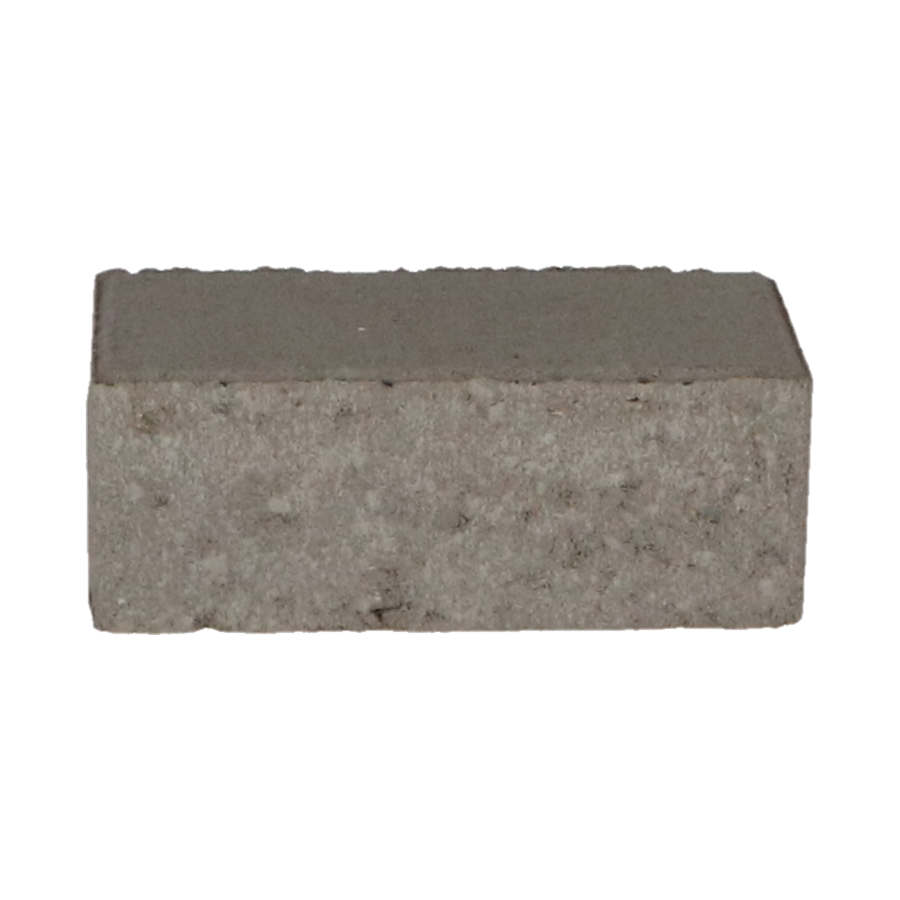 Betonstraatsteen met een natuursteenlook, rechthoekig van vorm, met een licht ruwe textuur. De afbeelding toont de steen in een neutrale belichting, geschikt voor gebruik in bestrating.