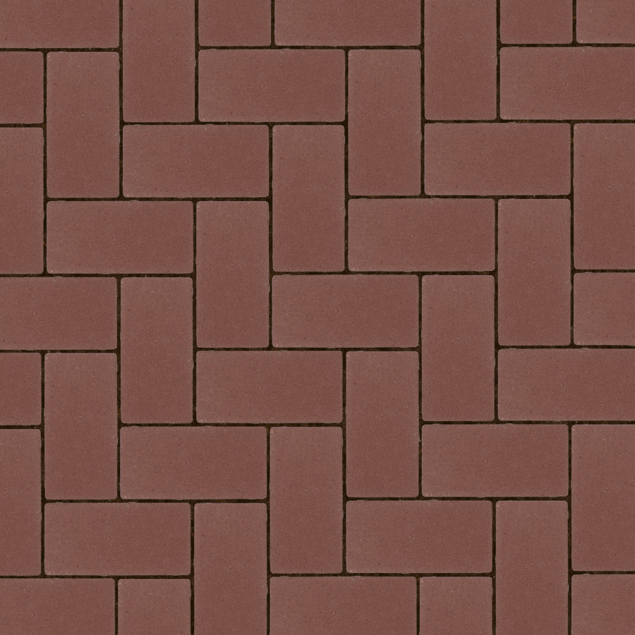 Straatbeeld met rode betonstenen gelegd in een elleboogverband. De stenen hebben een egale kleur en een fijne textuur, geschikt voor een strakke en moderne bestrating.