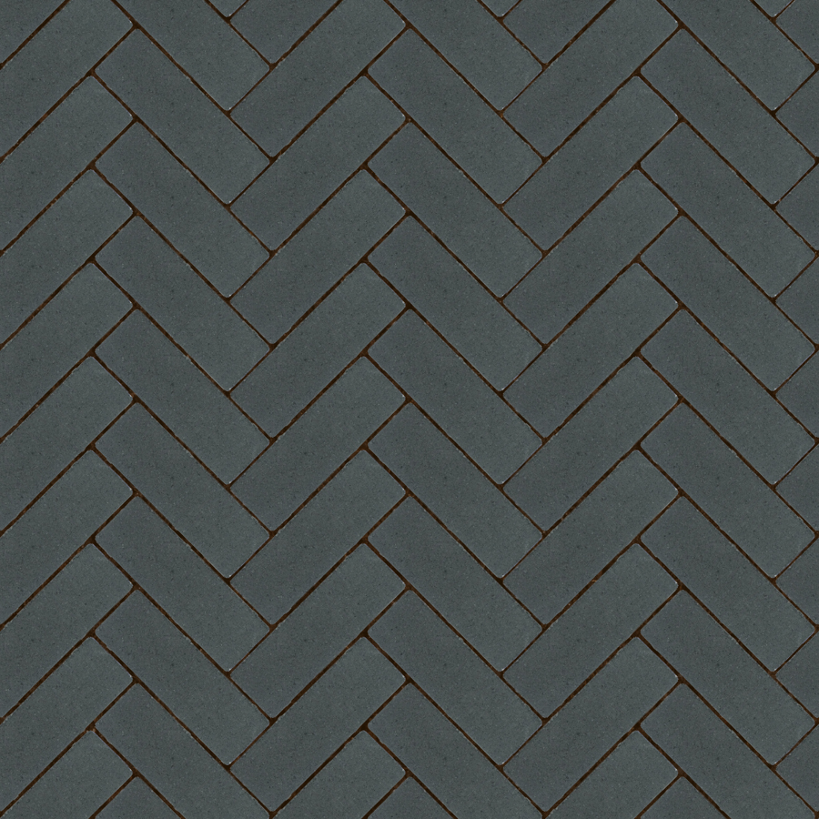 Straatbeeld met rode betonstenen gelegd in een keperverband. De stenen hebben een egale kleur en een fijne textuur, geschikt voor een strakke en moderne bestrating.